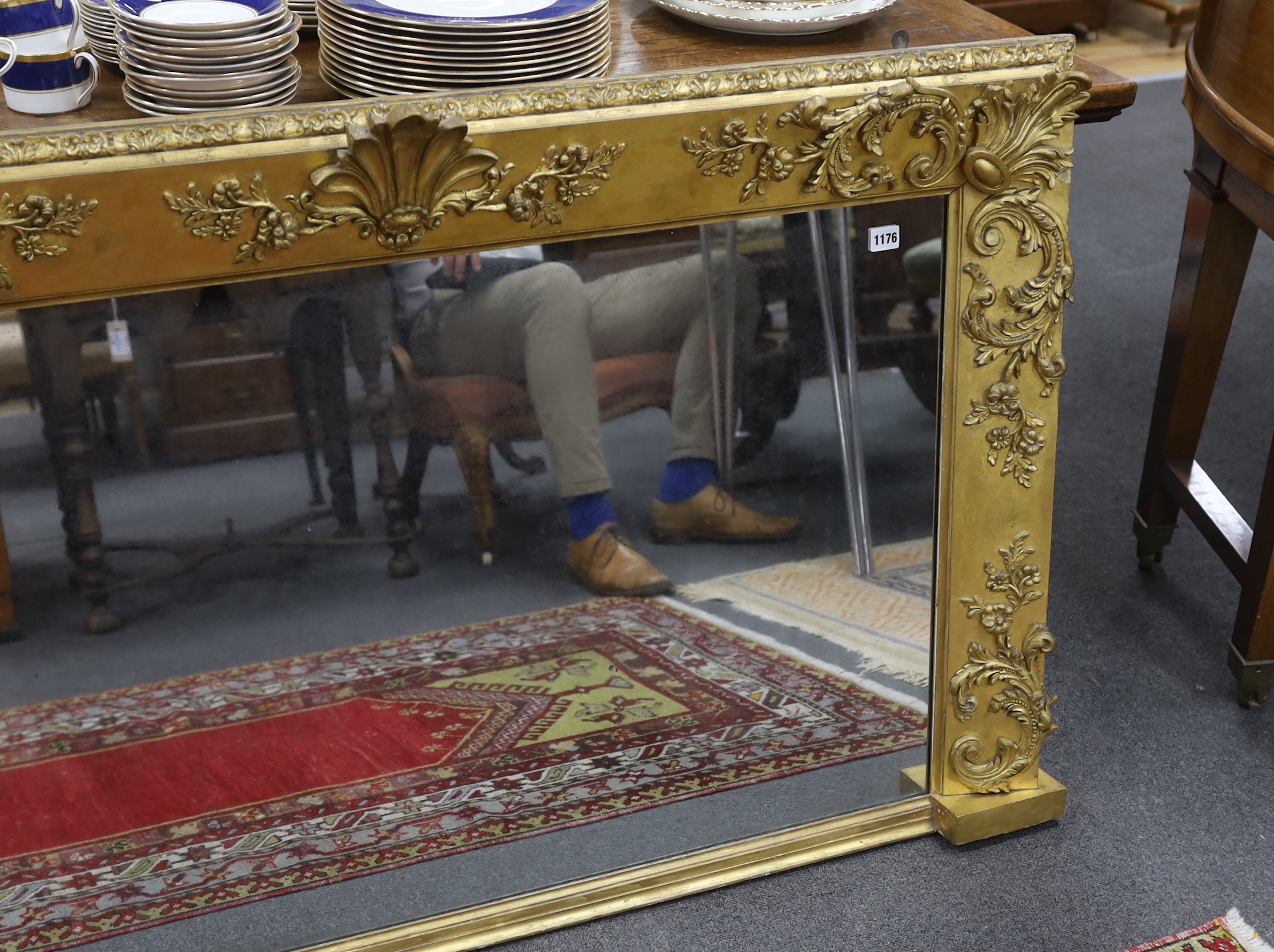 A Victorian giltwood and composition overmantel mirror width 139cm, height 83cm.